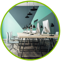 Series of desktop computers in a long table